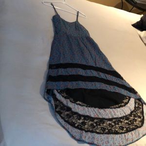 Beautiful blue dress. It is longer in the back.